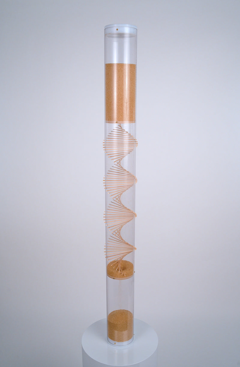 4’ tall clear cylindrical rainstick with a wooden spiral going through it contains amaranth, a tiny tan seed that produces 20 minutes of gentle rain sound as it falls. This XL long duration rainstick instrument by Rainstick Dreams is great for personal use and can be used during meditation or as a sleep aid.