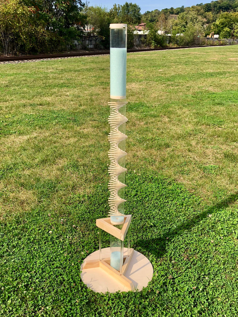 large spiral sounds Rainstick Dreams Stand keeps your large rainstick standing tall and safe. Keep your rainstick upright with a stand!